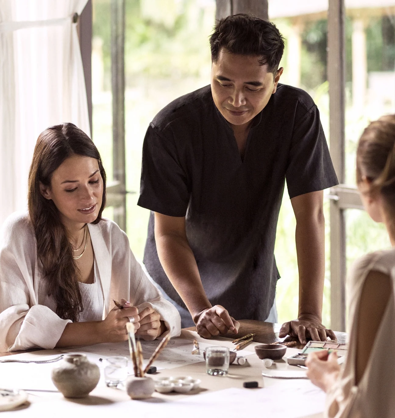 A small group exploring local craft at a workshop