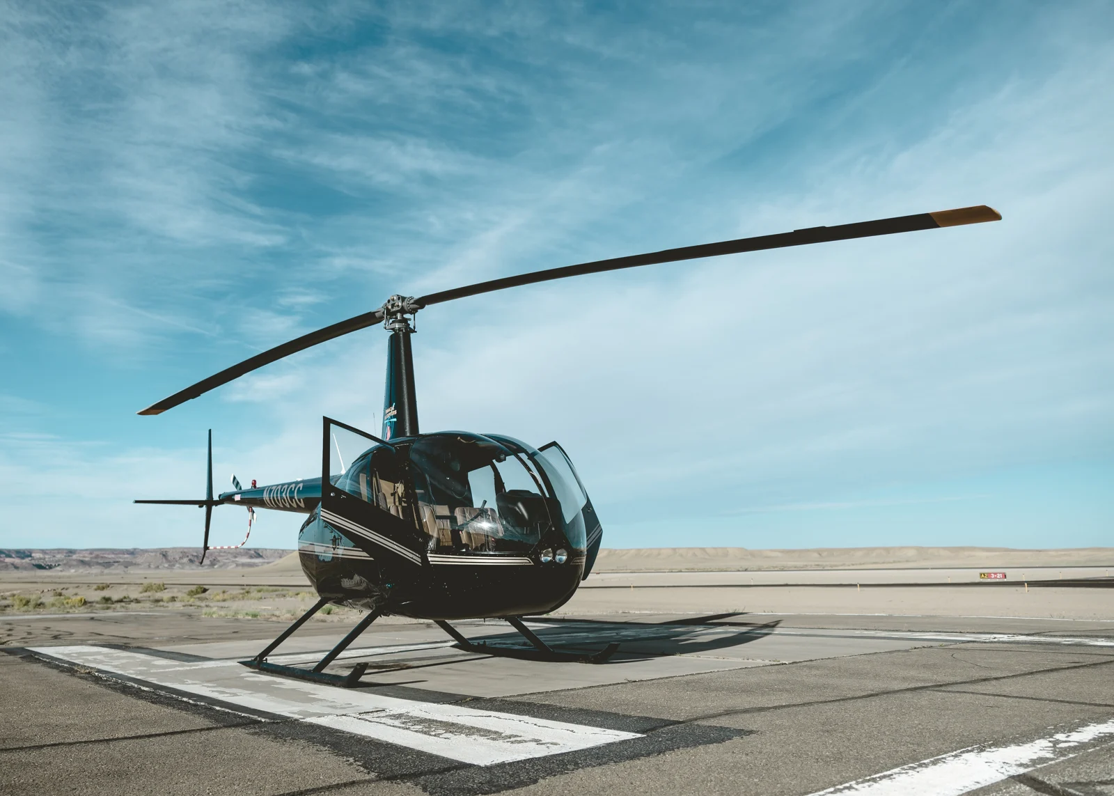 Helicopter on a seaside helipad