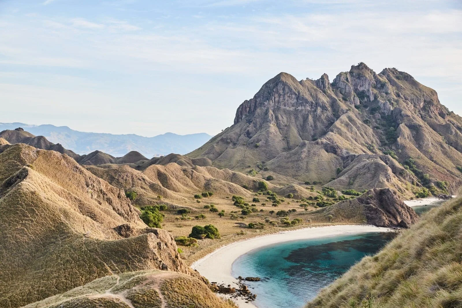 Folded ridgelines and bays on Padar Island